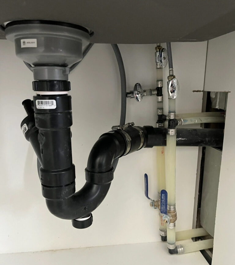 sink-drain-and-supply Sink drain and water supply with water shut offs.
