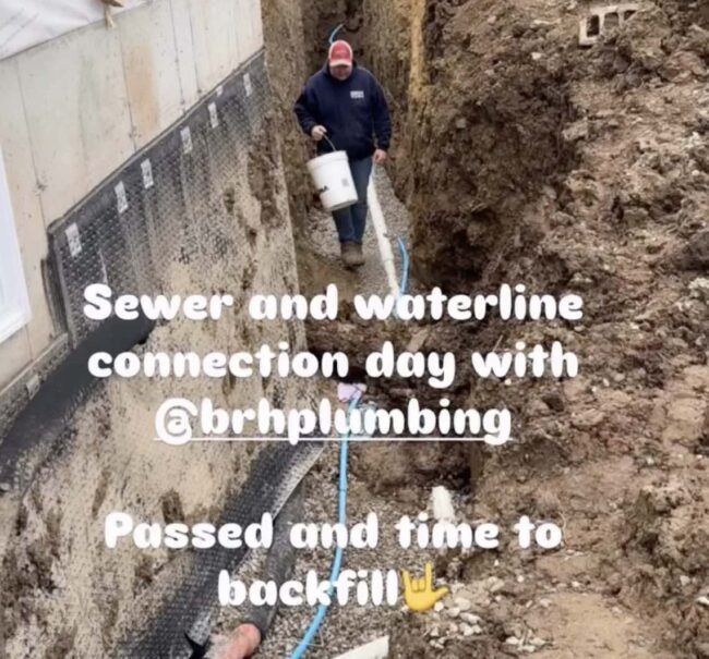 BRH Plumbing professionally backfilling a utility trench in Hamilton for ground stability.